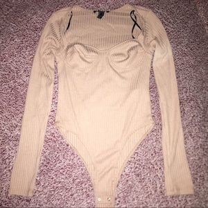 High cut tan/pink snap bodysuit